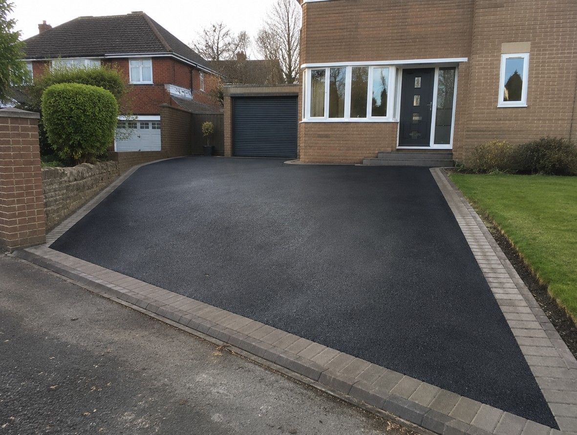 Freshly laid tarmac driveway at a semi-detached property in Treeton South Yorkshire