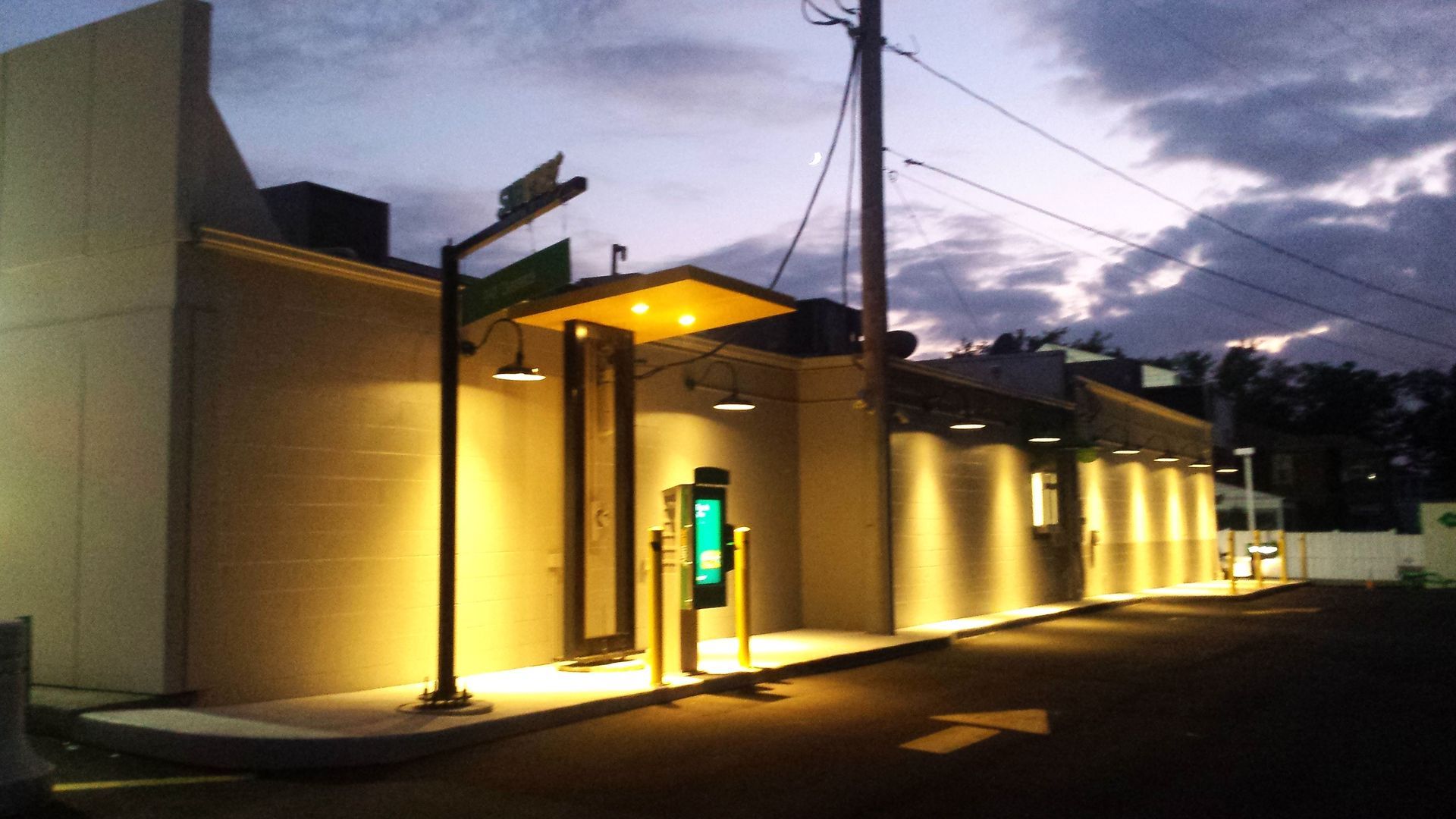 A building with a phone booth in front of it