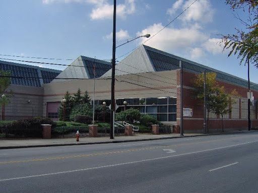 A large building with a fire hydrant in front of it