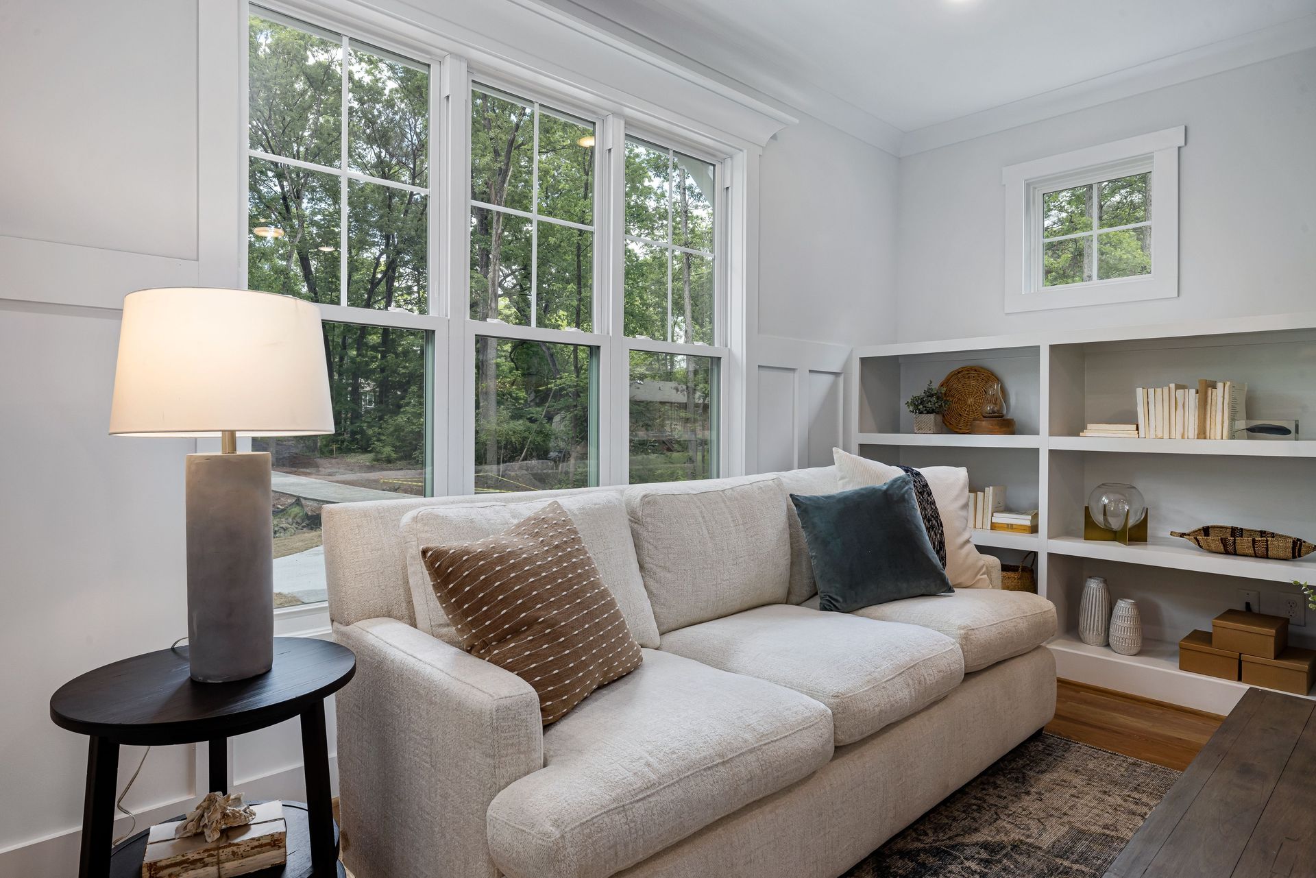 Bright living room with large double-hung windows