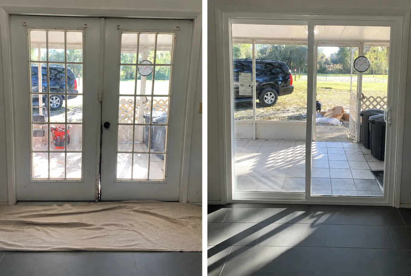 French doors with windows, one covered by a drop cloth, opening to a sunny yard and parked car.