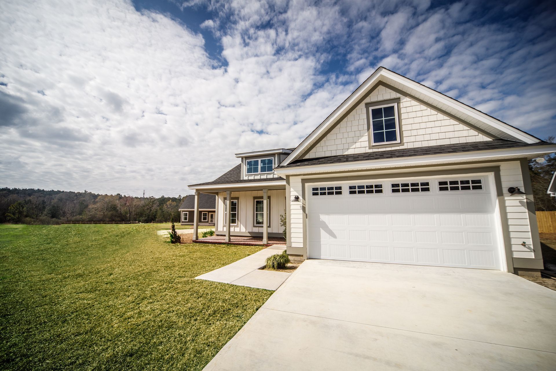 Modern new construction white siding cottage house. Modern new construction white siding cottage house.