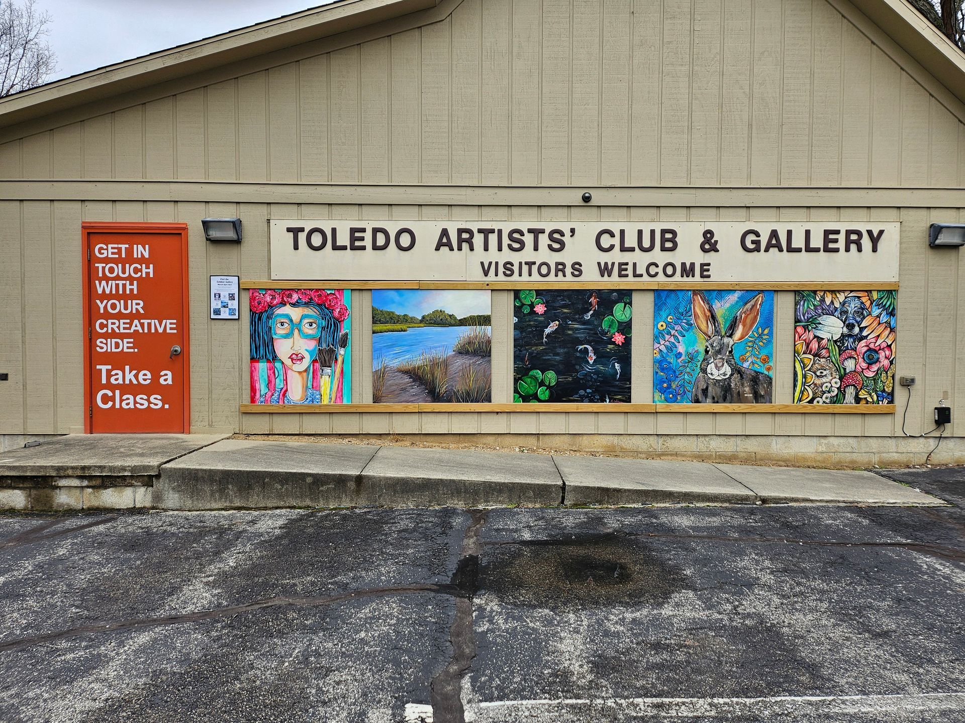 The toledo artists club and gallery is located in a parking lot