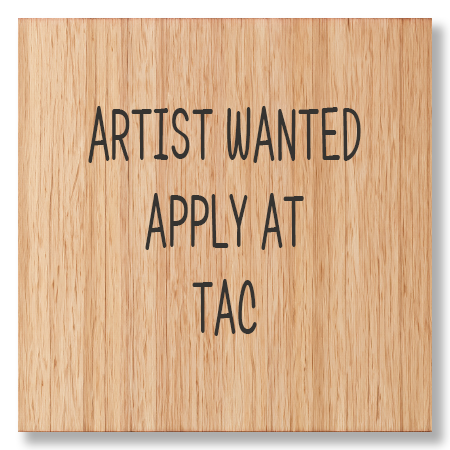A wooden sign that says artist wanted apply at tac