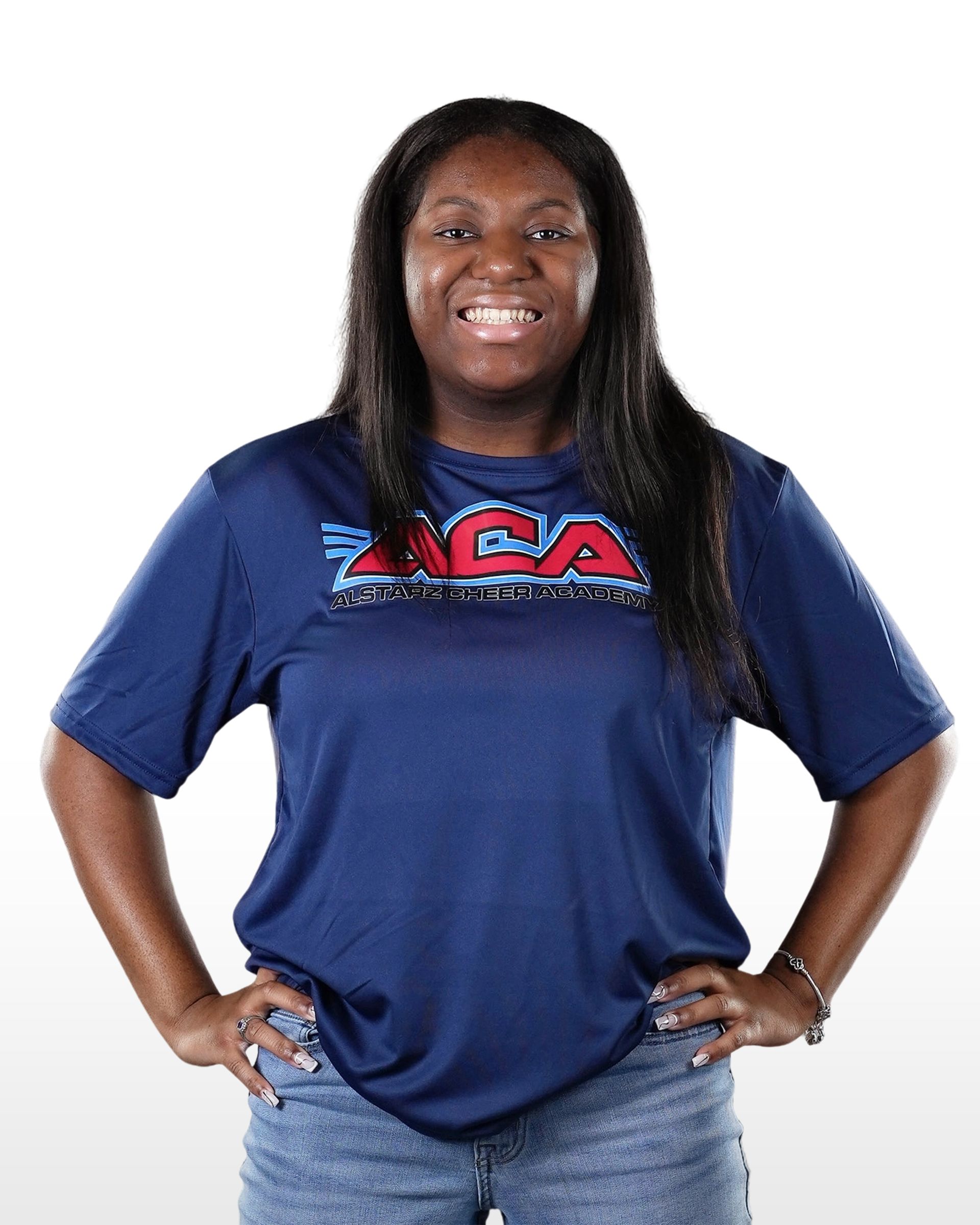 A woman wearing a blue shirt that says ncaa on it