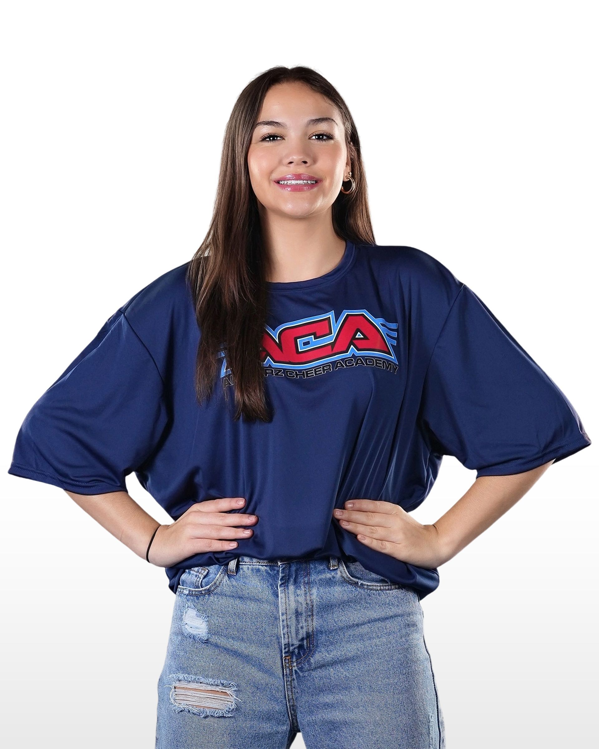 A woman wearing a blue t-shirt with the word ncaa on it