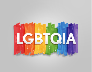 The word lgbtqia is on a rainbow background