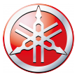 Red Yamaha logo with three tuning forks in a circular silver and red emblem