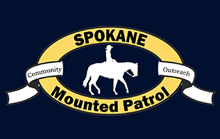 return to home page A logo for spokane mounted patrol with a man riding a horse linked to the website home page