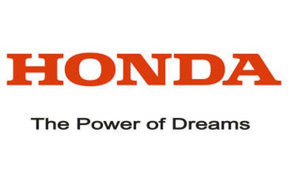 A honda logo that says the power of dreams