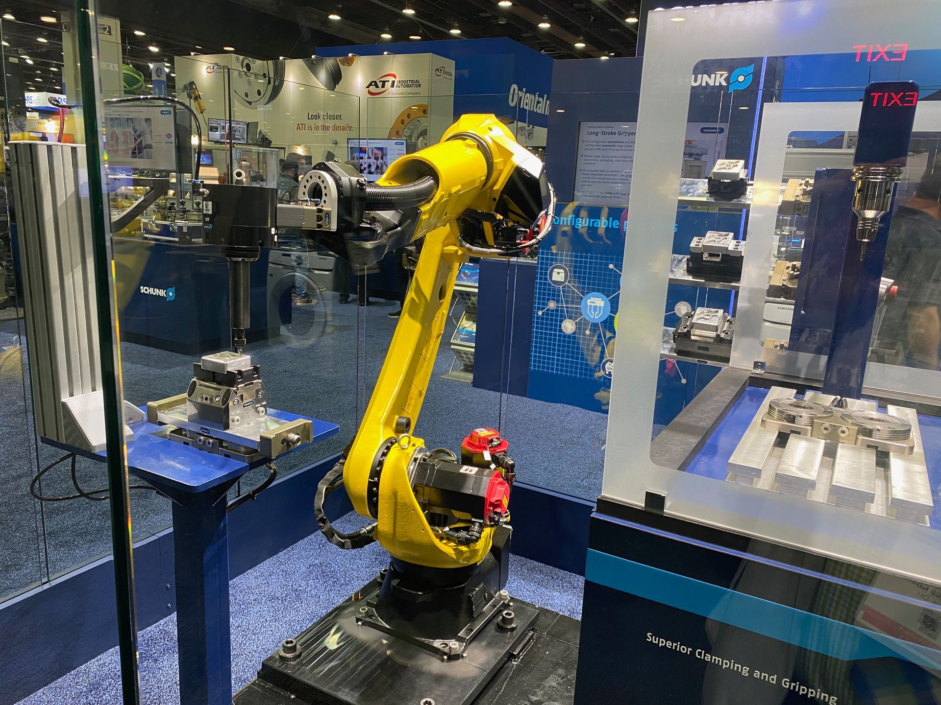 A robotic arm is sitting on a table in a room.
