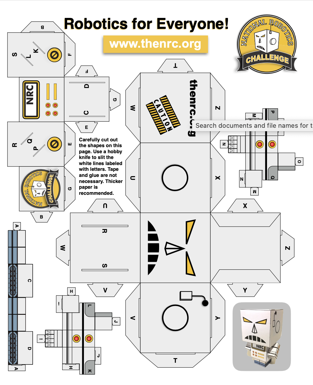 A paper model of a robot that says robotics for everyone