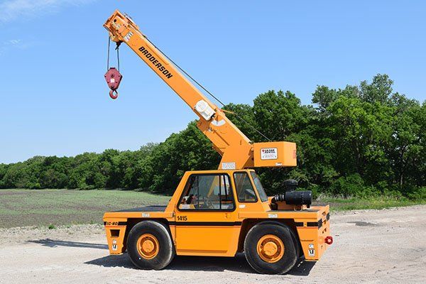 orange and black carry deck crane