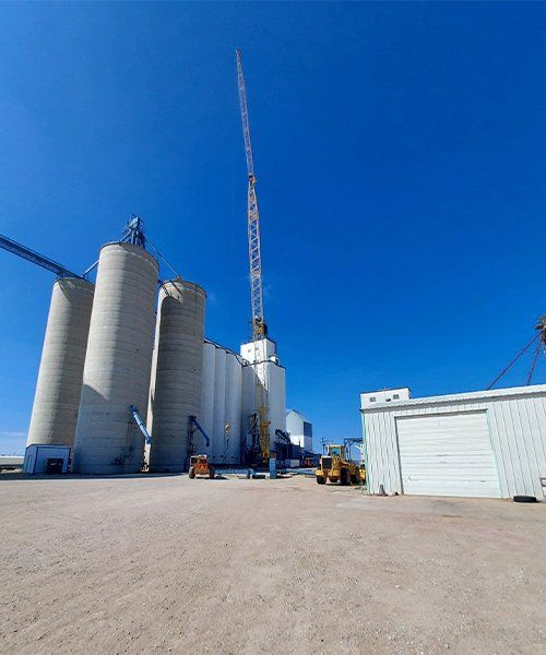 image of grain elevator with blue sky behind it on recent project