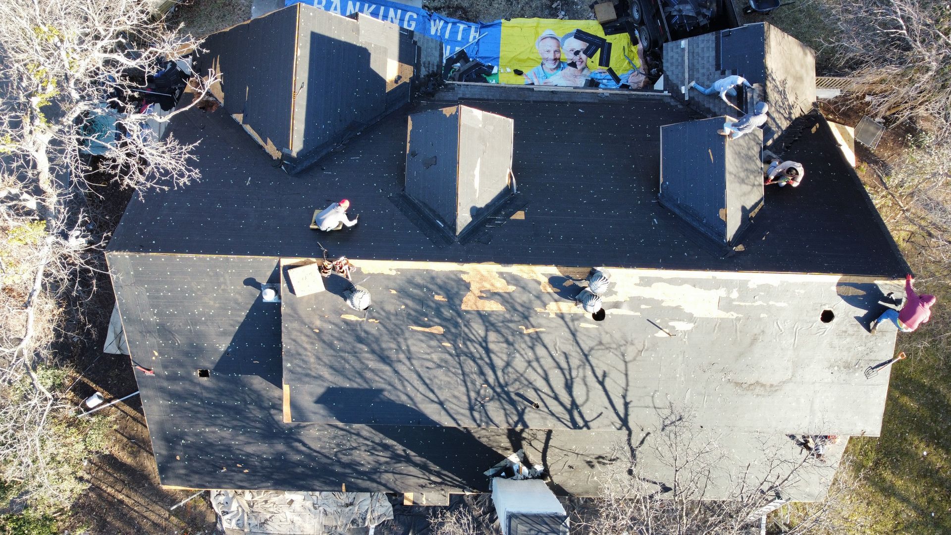 An aerial view of a house that has been damaged by a fire