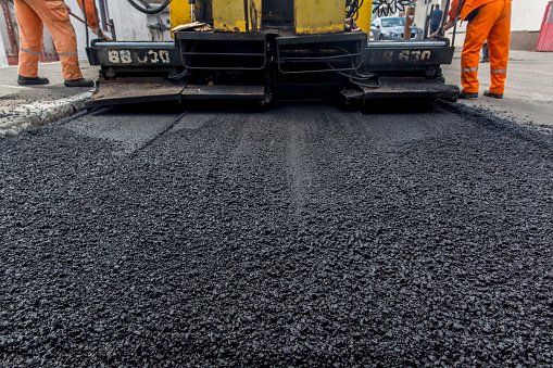 Asphalt Laying a New Layer — Honolulu, HI — Central Pacific Specialty Contractors