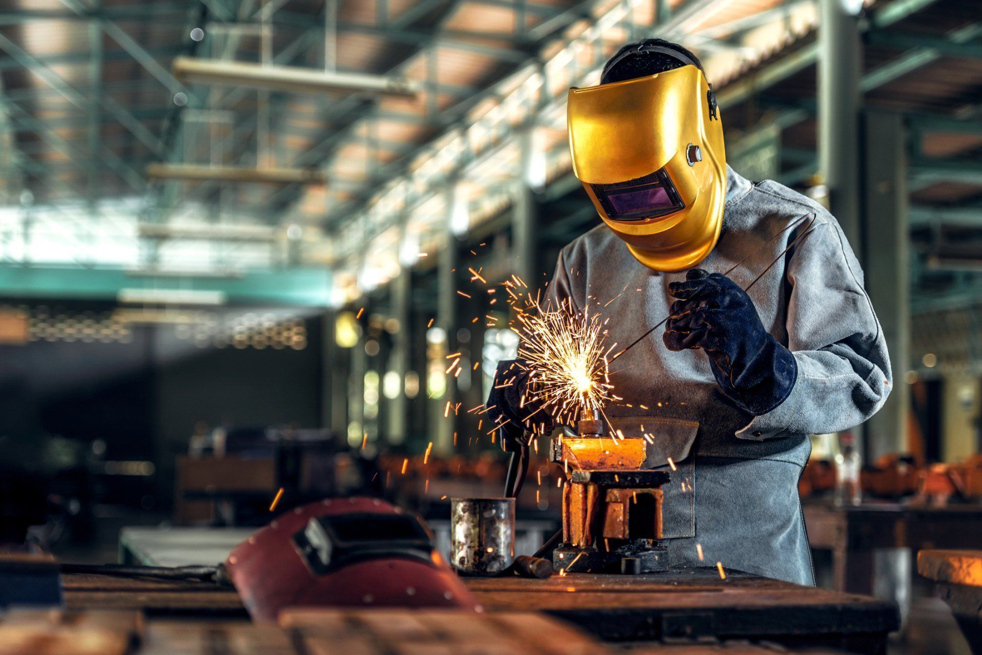 Man Welding Metal