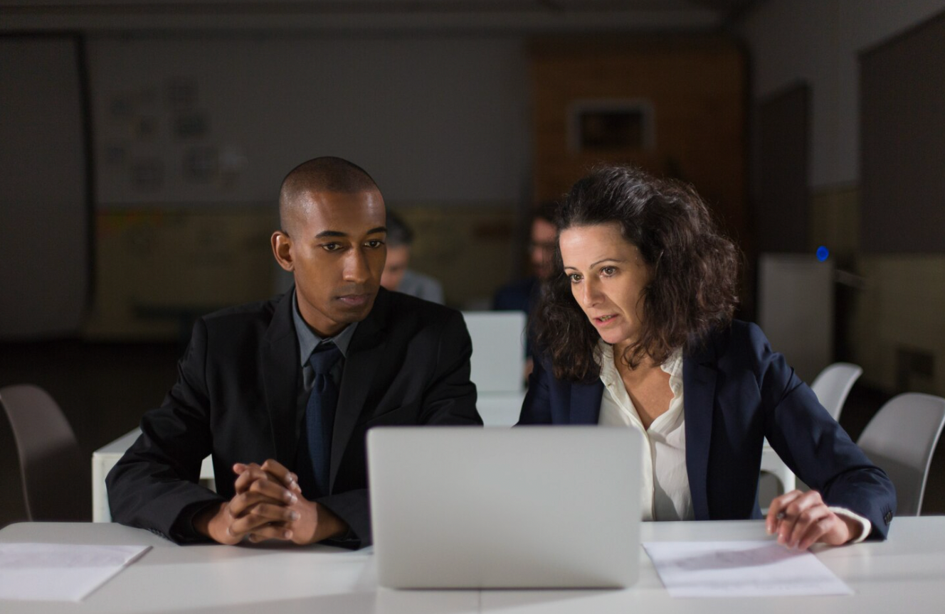 Business client discussing a contract with a Los Angeles attorney.