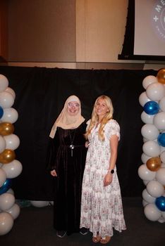 Current president (Curran Getzinger) and former president (Fatimah Alomar) at the Annual Medicats Gala
