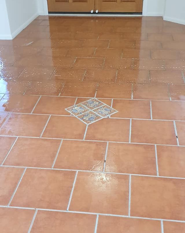 Ceramic Tile and Grout Clean Terracotta coloured Ceramic tile and grout cleaned with acid
