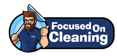 Focused on Cleaning Logo with white text and dark blue backgound with a bearded man holding acarpet cleaning tool to the left.