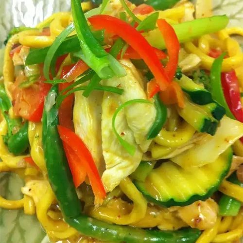 A Close Up Of A Plate Of Food With Noodles And Vegetables — One Thai Cuisine & Noodle Bar In Kirwan, QLD