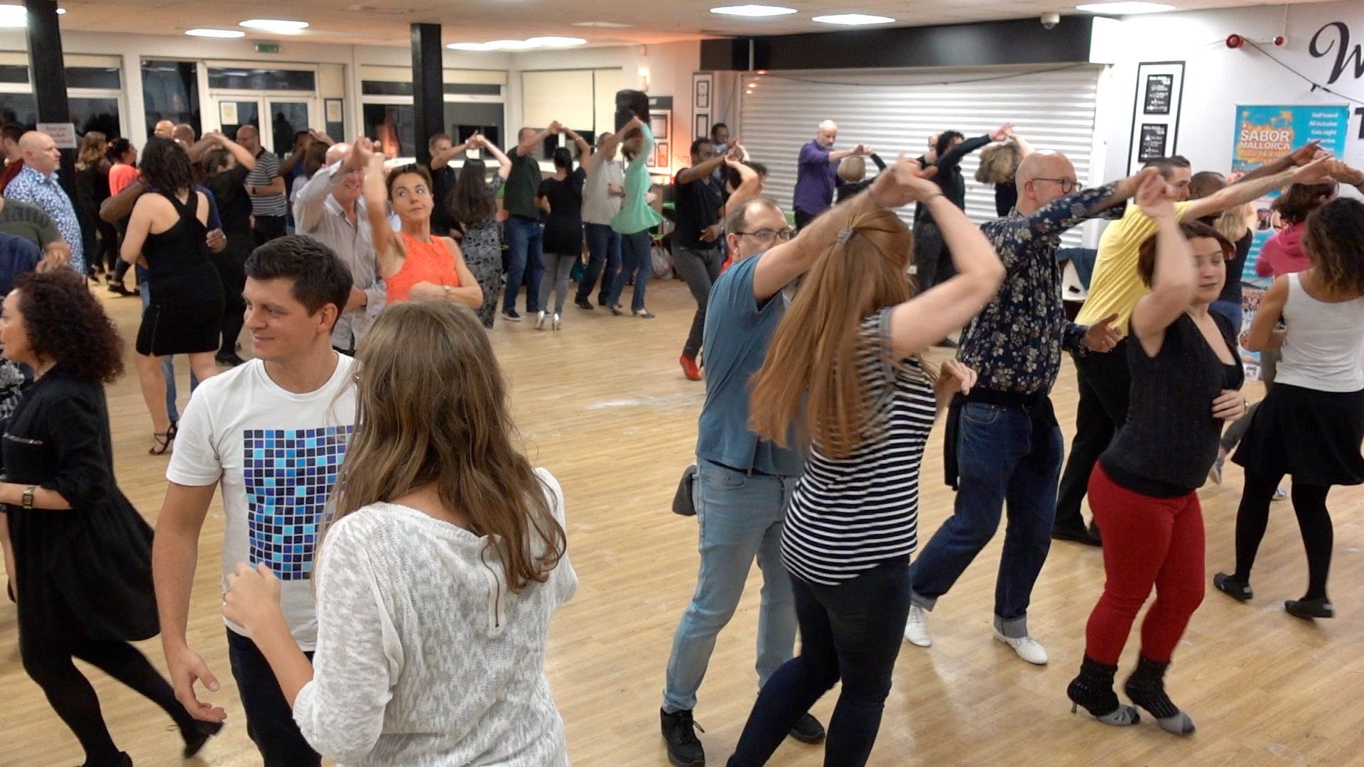 People learning salsa