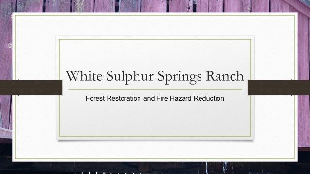 A white sign that says white sulphur springs ranch on it