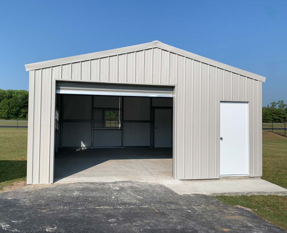 a metal garage with a white door and a window