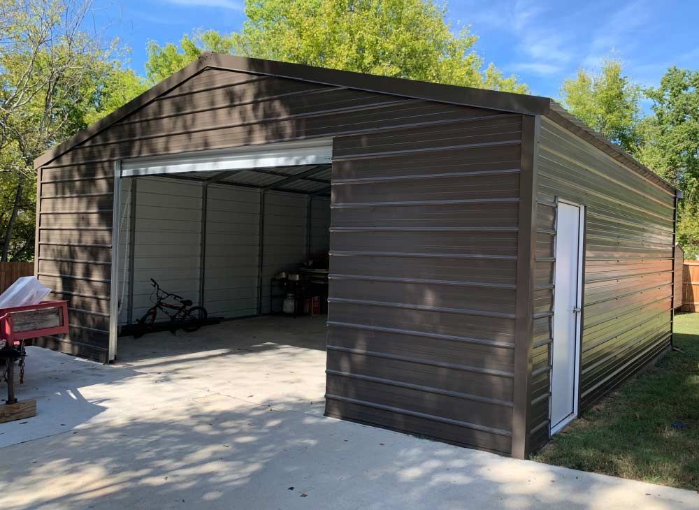 a metal garage with a bicycle parked inside of it .