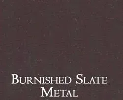 a close up of a burnished slate metal texture .