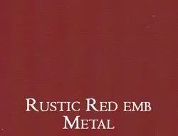 a close up of a red background with the words `` rustic red emb metal '' written on it .