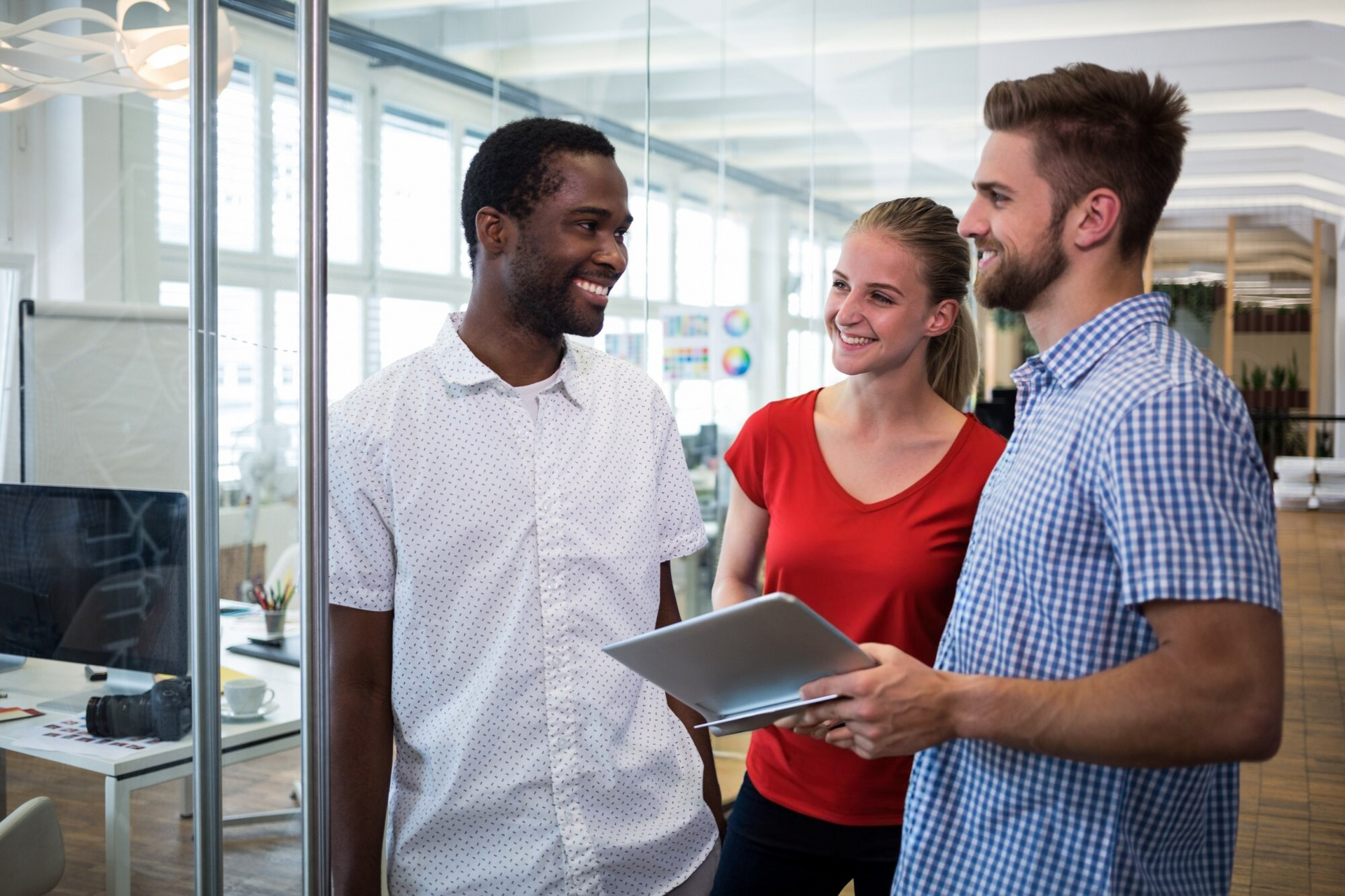 A team of professionals in an office, representing employee benefits packages and group employee benefits in Mississippi and Arkansas.