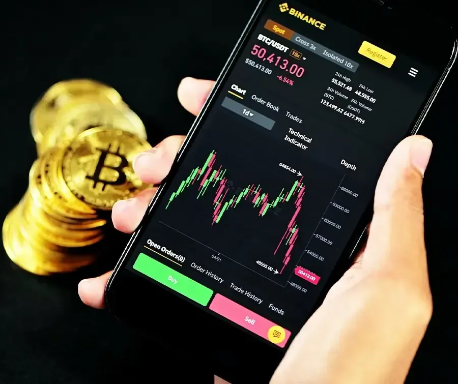 Black android smartphone displaying cryptocurrency application with bitcoin on the background