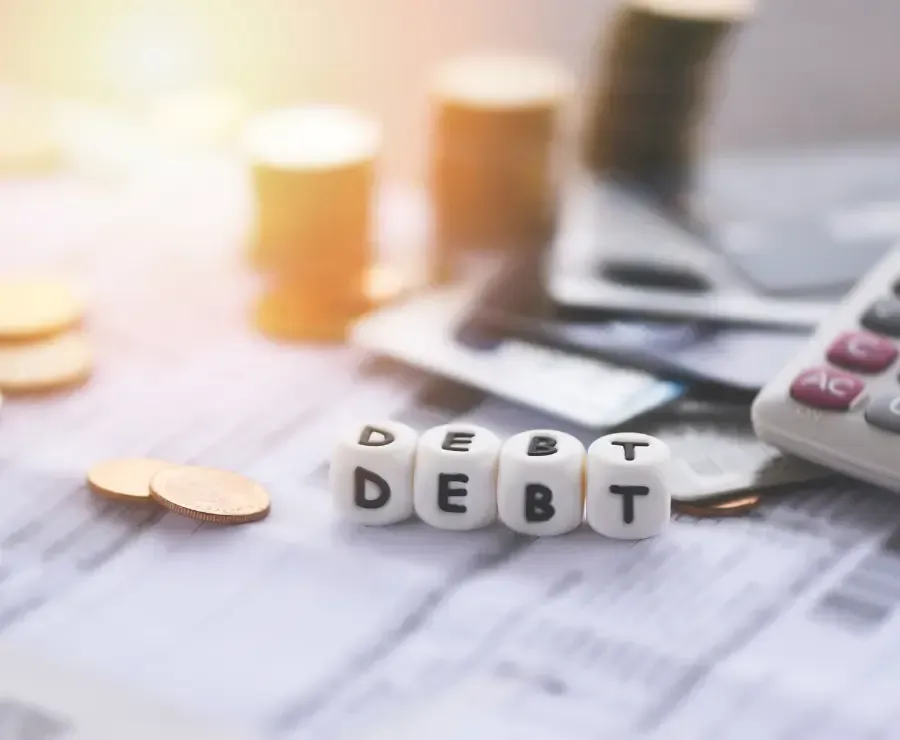 Debt credit card and money coin stack