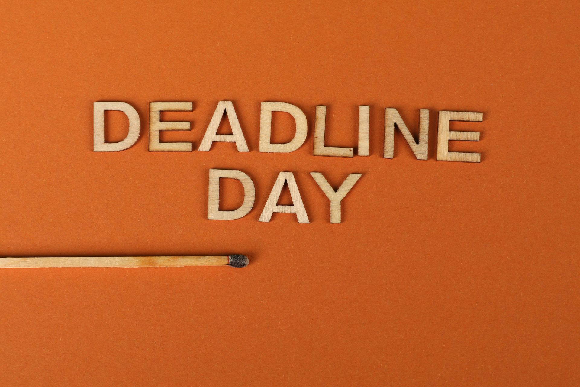 Orange background with “DEADLINE DAY” text and a pencil on the left