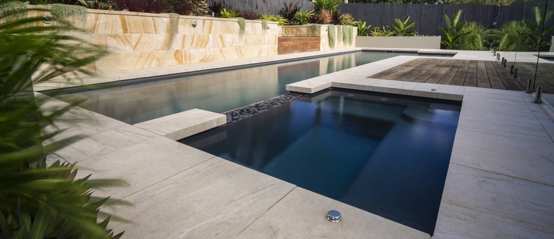 There is a Large Swimming Pool in the Middle of the Backyard — Azure Pools Mid North Coast In Harrington, NSW
