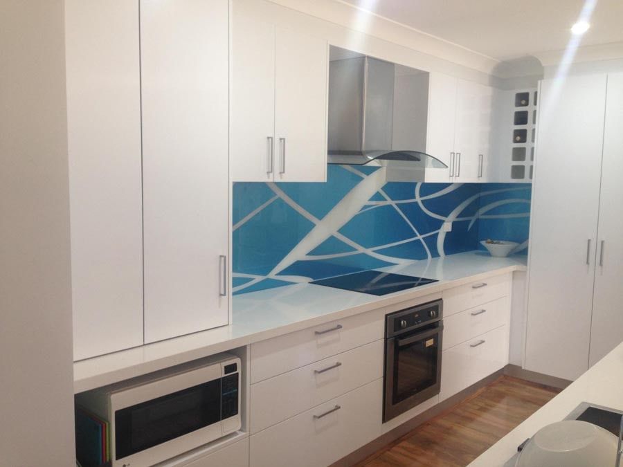 A Kitchen With White Cabinets and Stainless Steel Appliances — DecoGlaze in Penrith, NSW