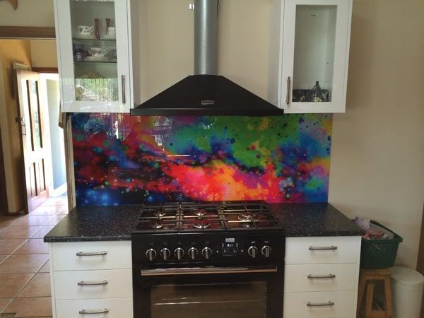 A Kitchen With a Stove and a Painting on the Wall — DecoGlaze in Penrith, NSW