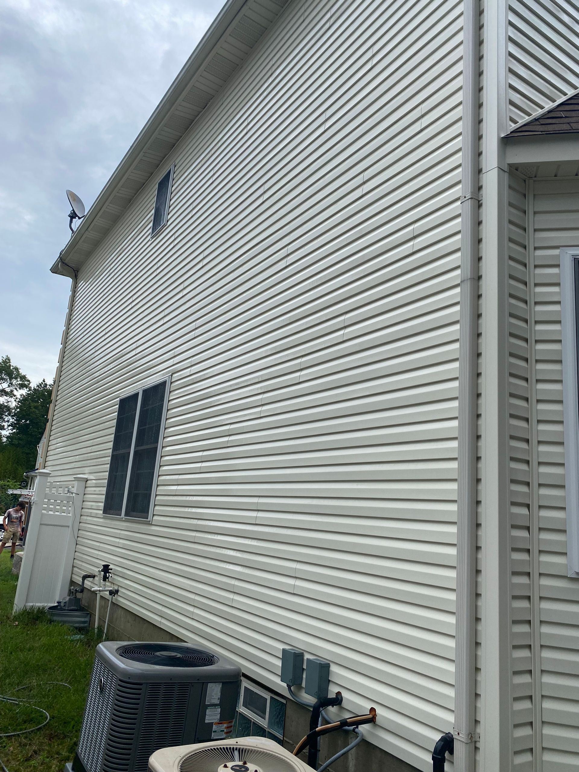 Mold power washed off house