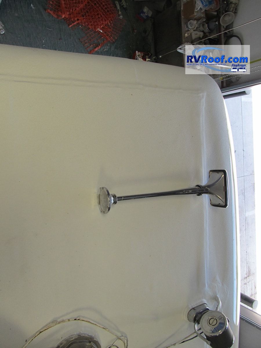 A roof of an RV with fresh Flex Armor