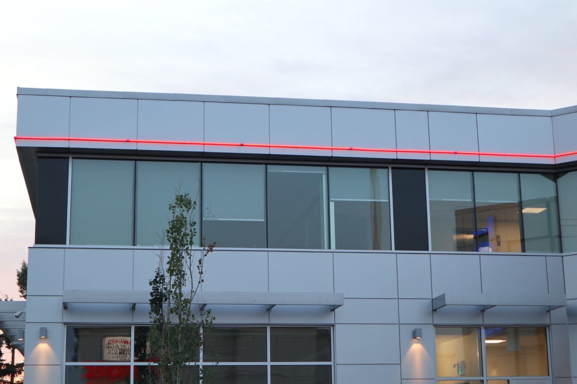 the outside of a building with a sign that says ' toyota ' on it