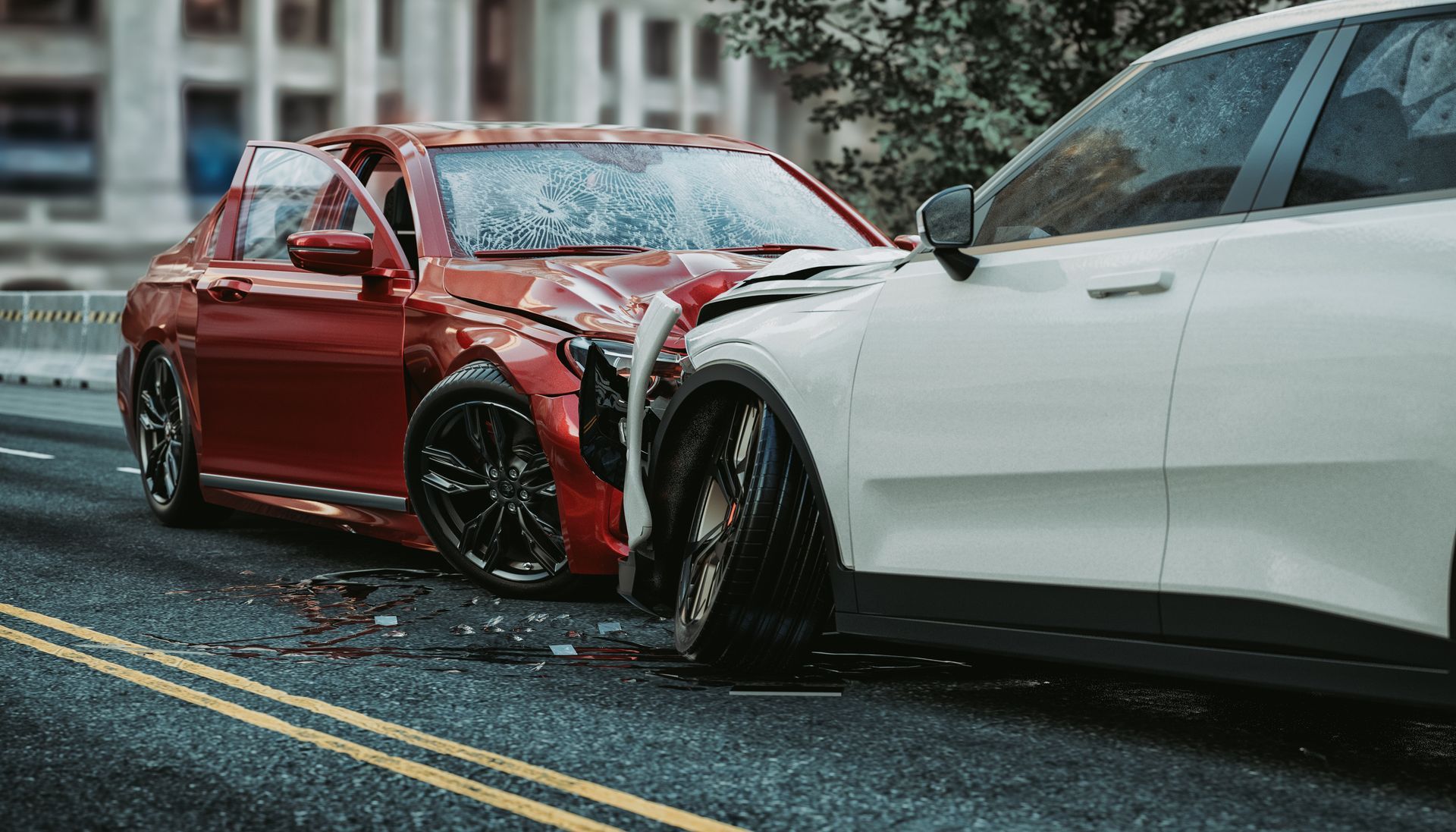 A red car is heavily damaged.