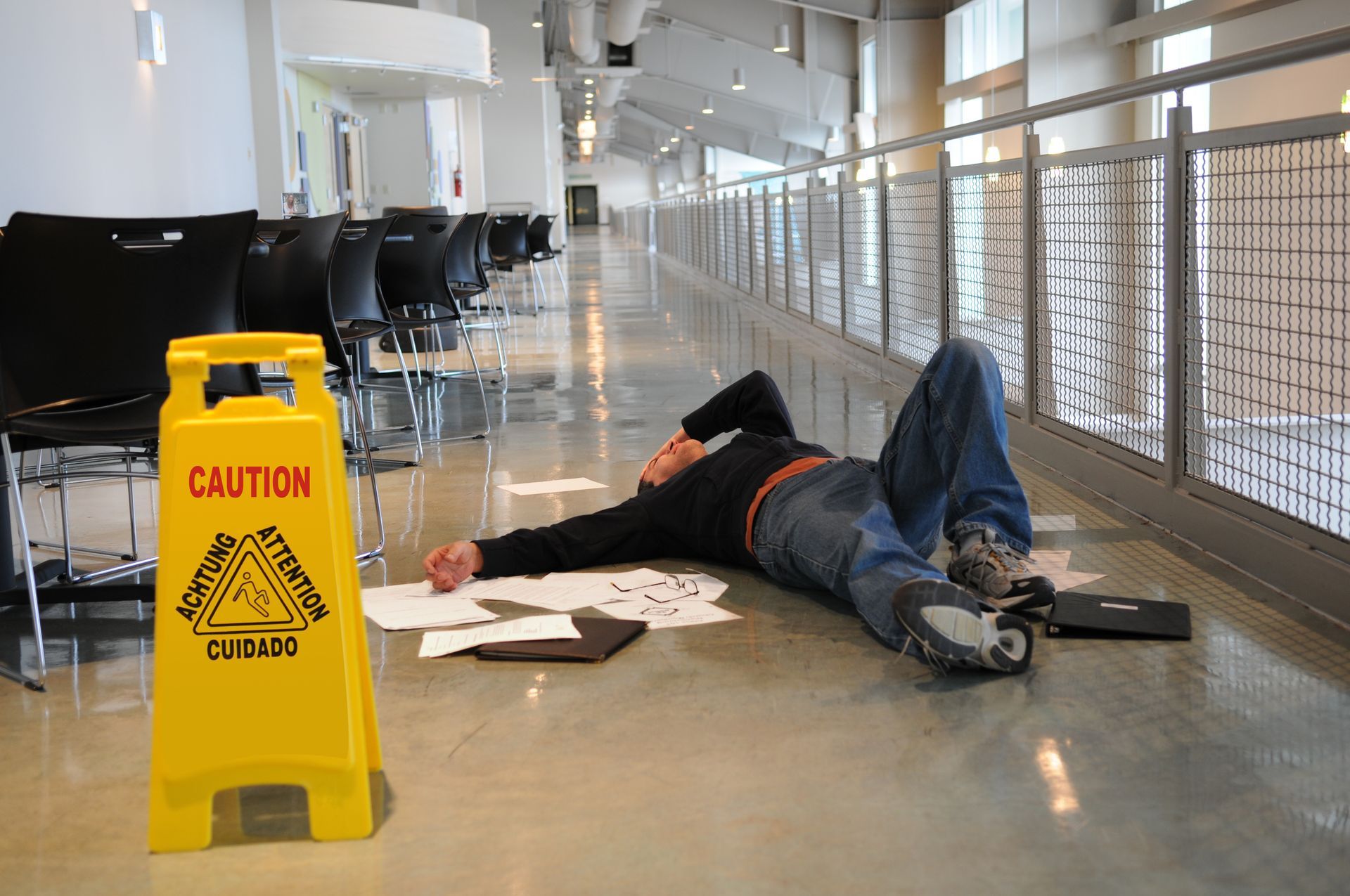 Man sprawled on floor.