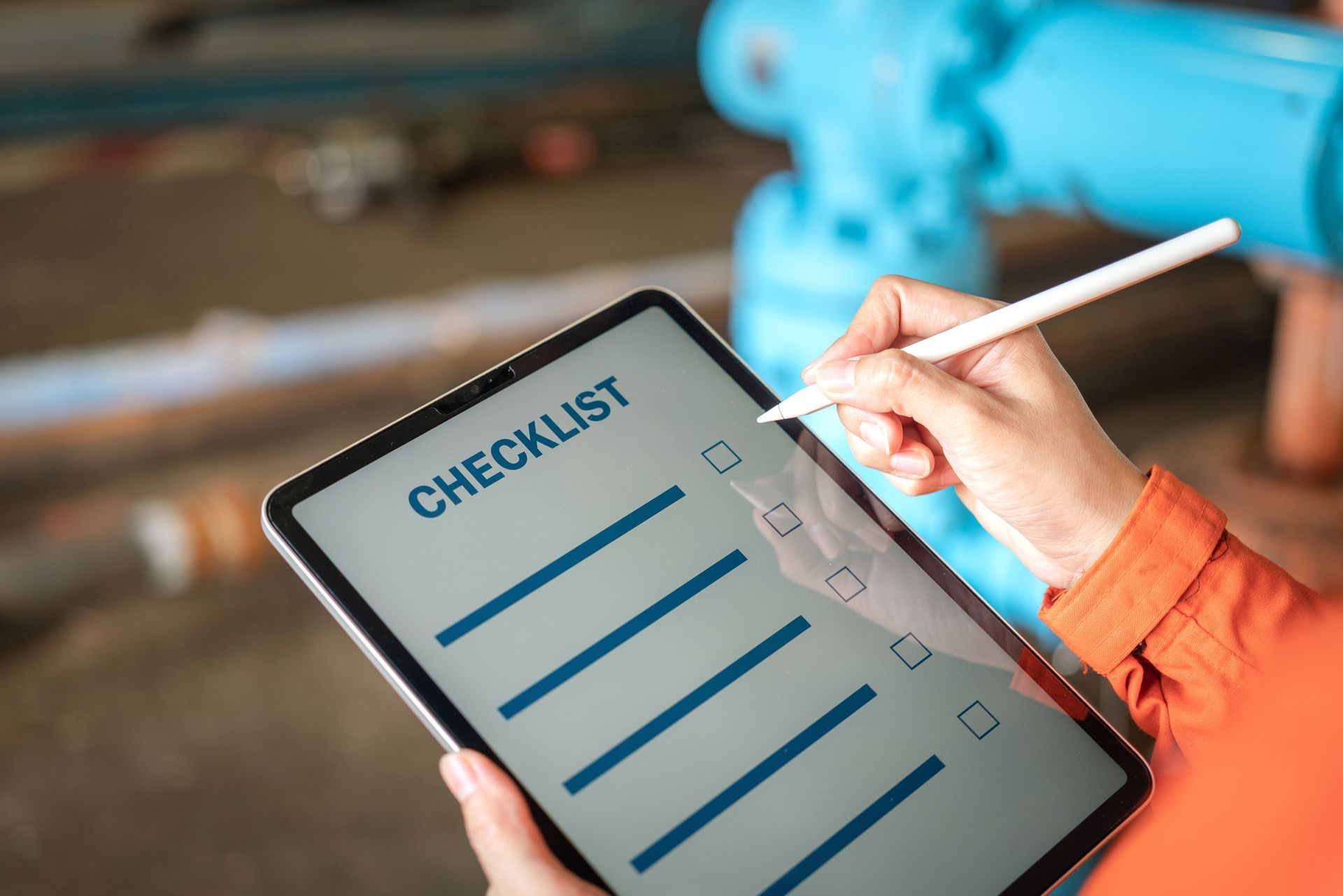 Person completing a check list.