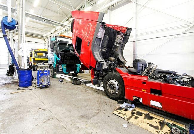 Semi getting repaired at Crutcher Brothers Parts & Equipment Inc