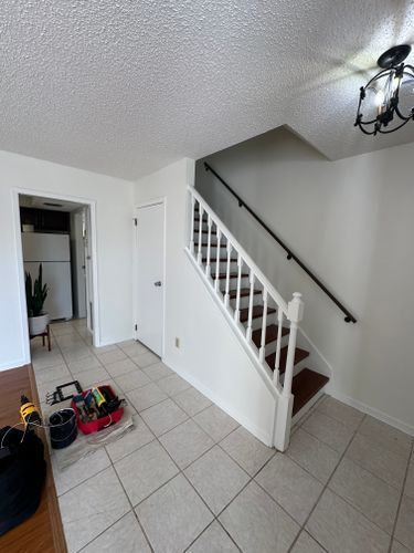 There is a staircase in the middle of the room.