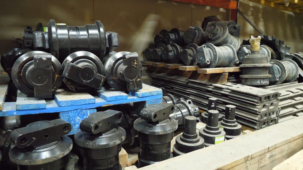 A Warehouse Filled With Lots Of Different Types Of Metal Parts — Macquarie Brake & Automotive Services In Laurieton, NSW