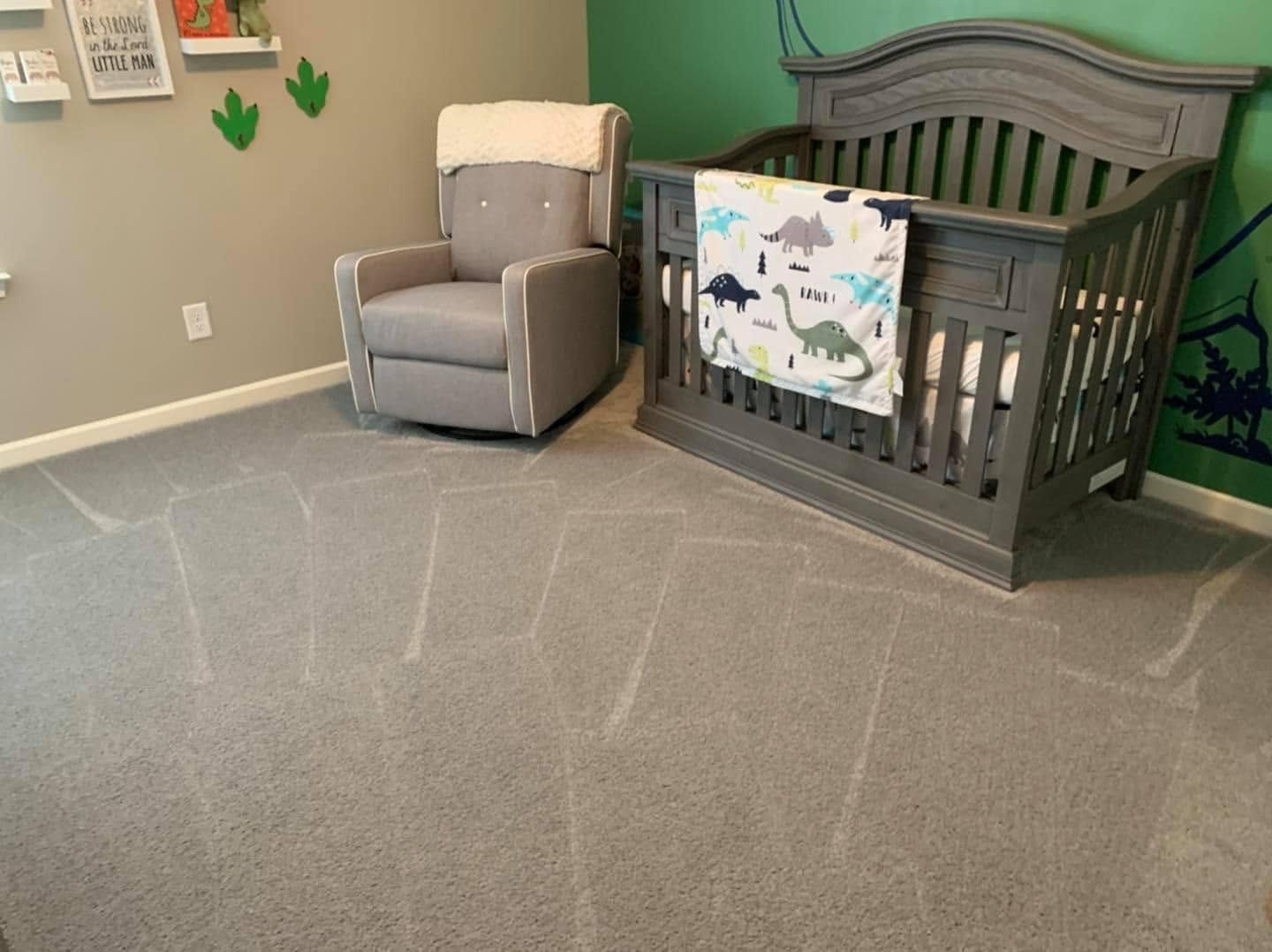Carpeted staircase with white banisters leading up to an upper hallway.