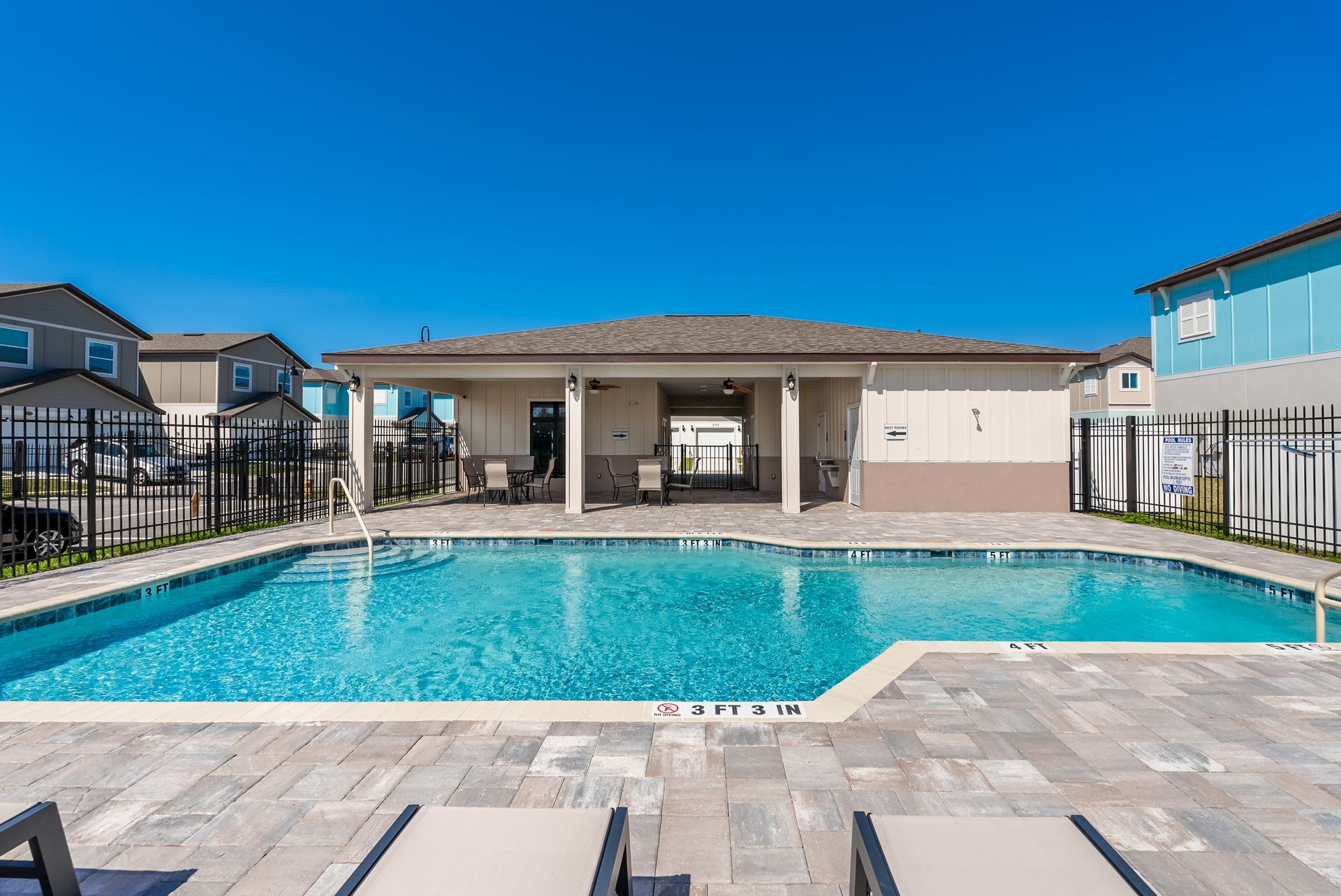 swimming pool and clubhouse at whitney place townhomes